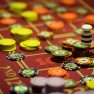 close-up of casino chips on the red table close-up of casino chips on the red table